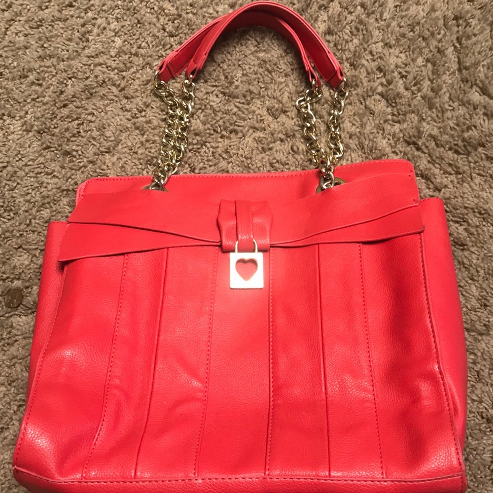 Peach Betsey Johnson bag.